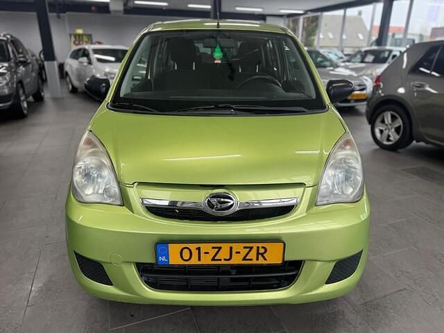 Occasion Daihatsu Cuore 69 PK (50 kW) 2008 Groen (metallic) Hatchback
