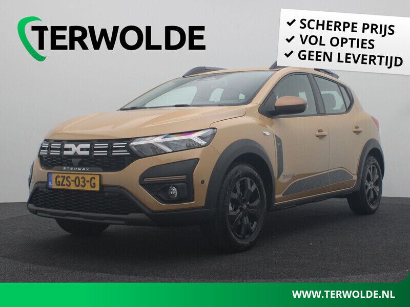 Bruin Nieuw 2024 Dacia Sandero Stepway Hatchback | € 24.340 - Afbeelding 1/4