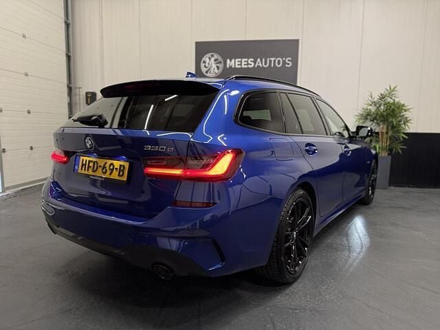 Occasion BMW 330 Executive 291 PK (214 kW) 2021 Blauw Stationwagen
