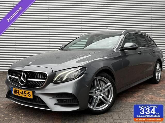 Grijs Gebruikt 2017 Mercedes E400 AMG Stationwagen | € 24.950 - Afbeelding 1/4