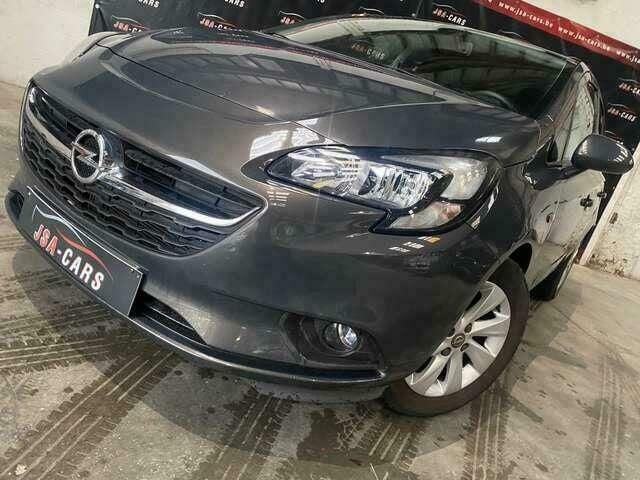 Grijs Gebruikt 2015 Opel Corsa Enjoy Sedan | € 9.999 (Eerlijke prijs) - Afbeelding 1/4