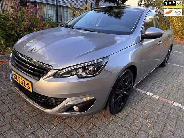 Grijs Gebruikt 2015 Peugeot 308 Premium Stationwagen | € 7.650 (Goede deal) - Afbeelding 1/4