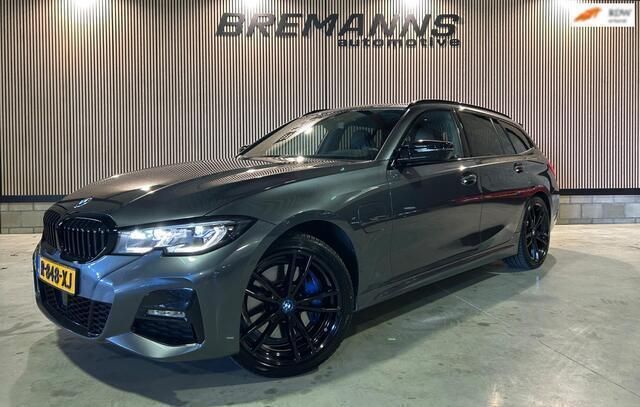 Grijs Gebruikt 2022 BMW 330 Executive Stationwagen | € 42.950 (Duur) - Afbeelding 1/4
