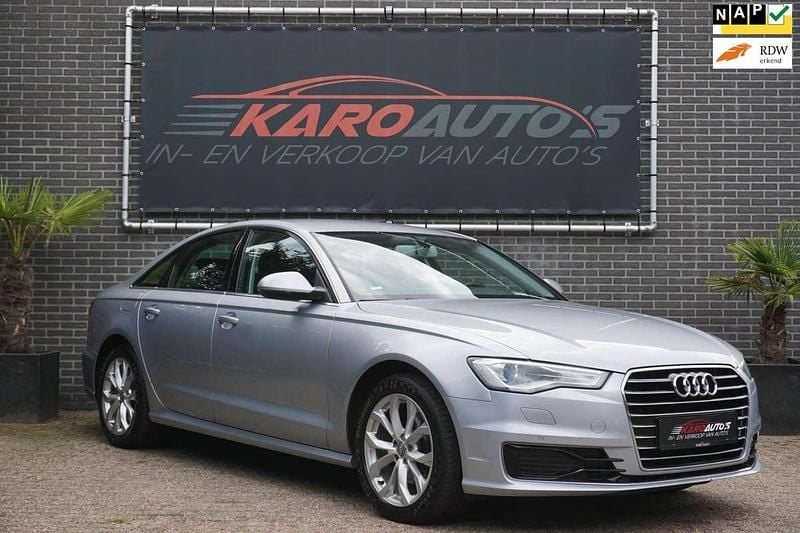 Grijs Gebruikt 2015 Audi A6 Business Sedan | € 17.950 (Goede deal) - Afbeelding 1/4