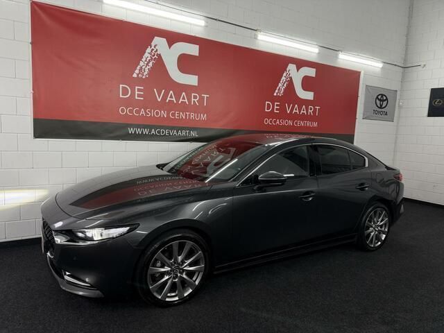 Grijs Gebruikt 2019 Mazda 3 Luxury Sedan | € 13.950 (Eerlijke prijs) - Afbeelding 1/4