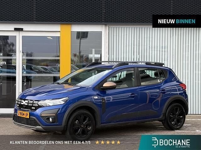 Blauw Occasion 2024 Dacia Sandero Extreme Hatchback | € 18.745 (Eerlijke prijs) - Afbeelding 1/4