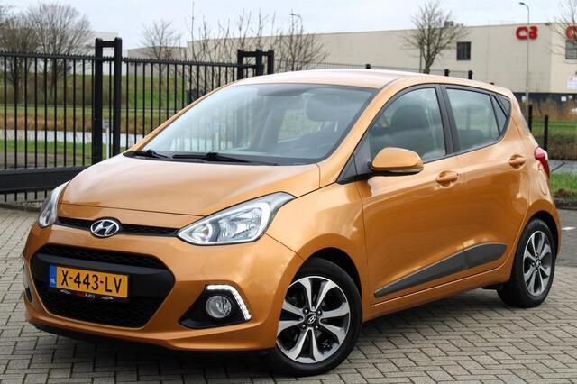 Oranje Gebruikt 2014 Hyundai i10 Hatchback | € 6.950 (Iets duurder) - Afbeelding 1/4