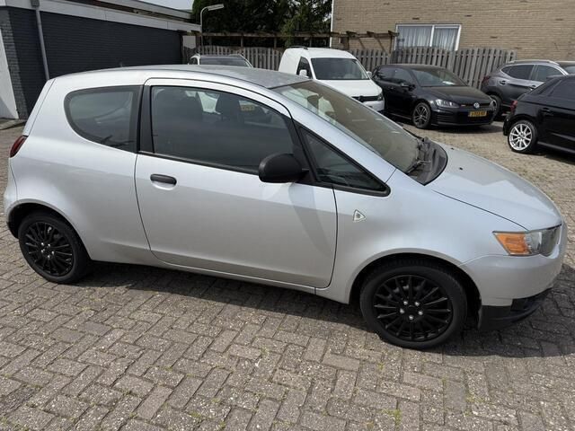 Grijs Gebruikt 2009 Mitsubishi Colt Hatchback | € 1.950 (Goede deal) - Afbeelding 1/4