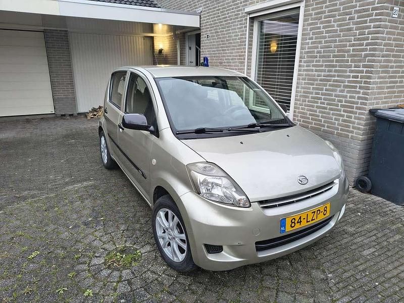 Occasion Daihatsu Sirion 69 PK (50 kW) 2010 Beige Hatchback