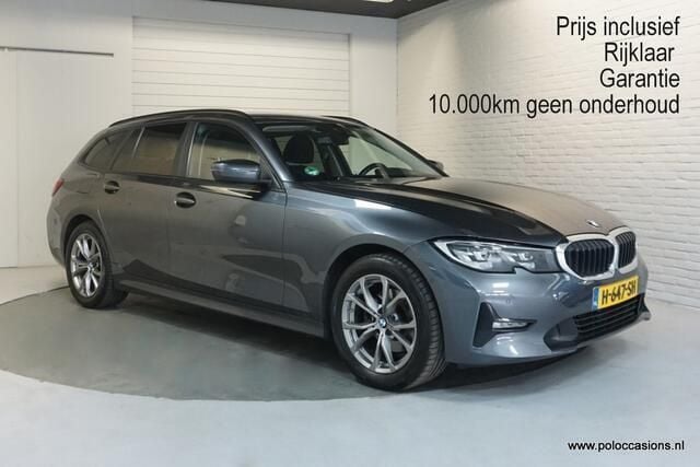 Grijs Gebruikt 2020 BMW 320 Executive Stationwagen | € 25.900 (Goede deal) - Afbeelding 1/4