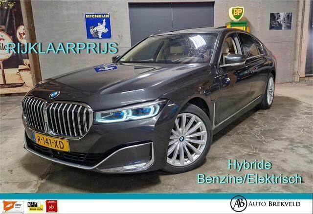 Grijs, metallic lak Gebruikt 2020 BMW 745e Executive Sedan | € 47.500 (Super prijs) - Afbeelding 1/4