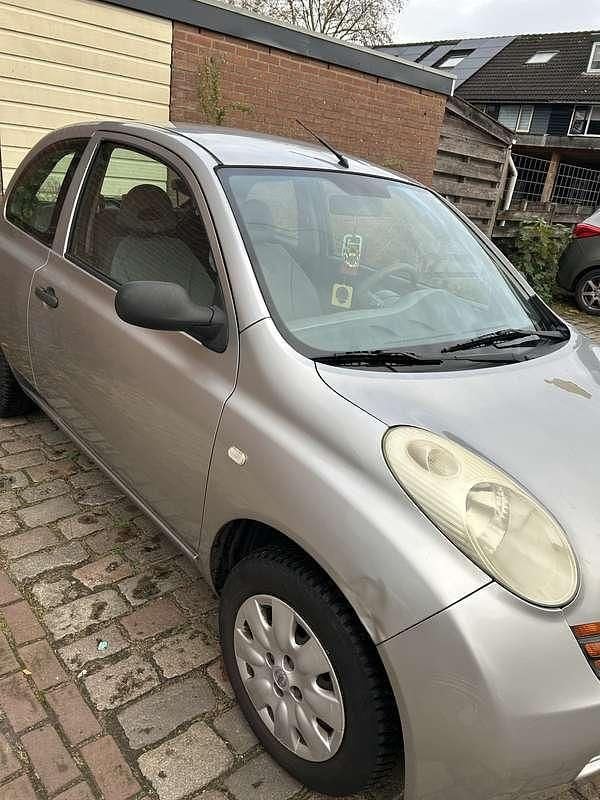 Grijs Gebruikt 2004 Nissan Micra Visia Hatchback | € 620 (Goede deal) - Afbeelding 1/4