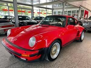 Roodindischrot Gebruikt 1986 Porsche 911 Turbo Coupé | € 135.500 - Afbeelding 1/4