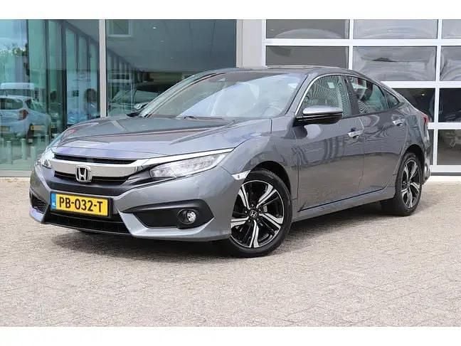Grijs Gebruikt 2017 Honda Civic Executive Hatchback | € 18.950 (Goede deal) - Afbeelding 1/4