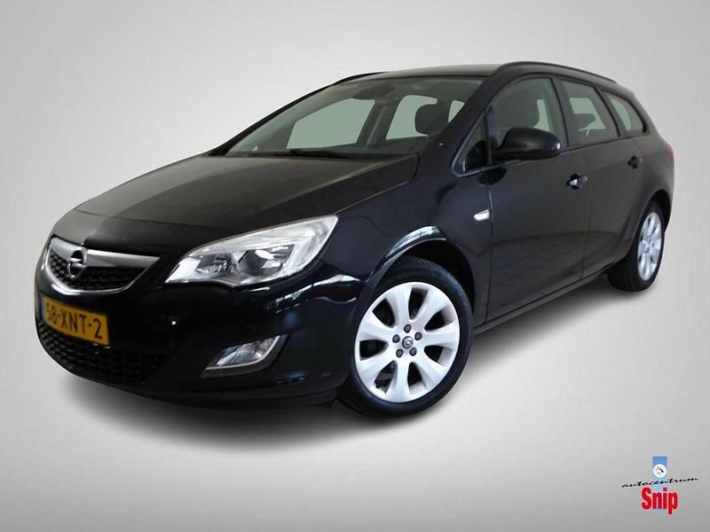Zwart Gebruikt 2012 Opel Astra Cosmo Stationwagen | € 4.950 (Eerlijke prijs) - Afbeelding 1/4