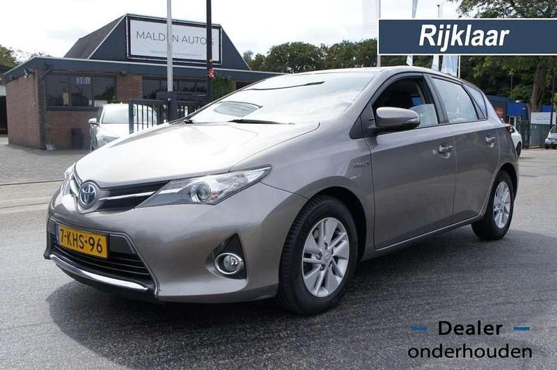 Bruin Gebruikt 2013 Toyota Auris Hybrid Hatchback | € 10.999 (Eerlijke prijs) - Afbeelding 1/4