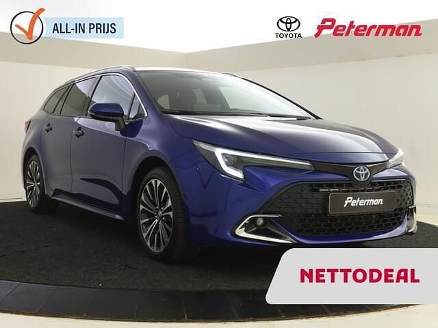 Blauw Gebruikt 2024 Toyota Corolla Hybrid Stationwagen | € 29.499 (Super prijs) - Afbeelding 1/4