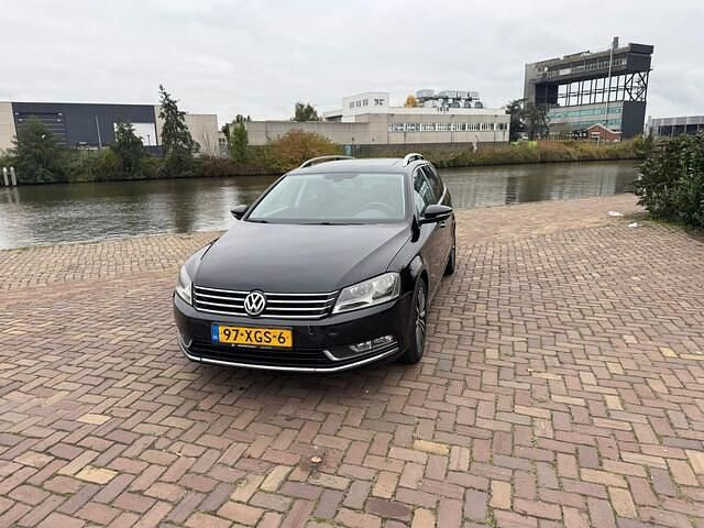 Zwart Gebruikt 2012 VW Passat Comfortline Stationwagen | € 4.850 (Iets duurder) - Afbeelding 1/4
