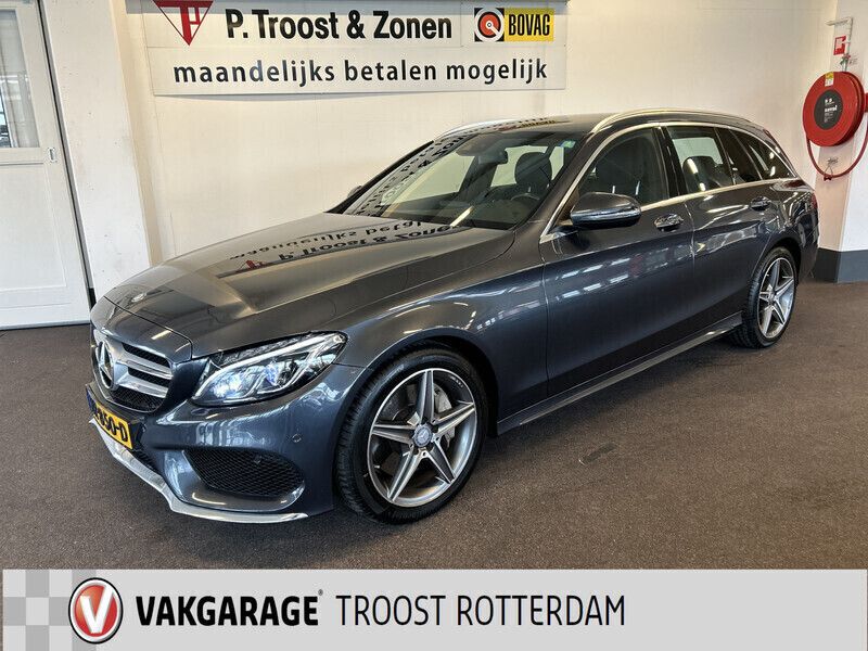 Grijs, metallic lak Gebruikt 2015 Mercedes C350 AMG Stationwagen | € 21.950 (Eerlijke prijs) - Afbeelding 1/4