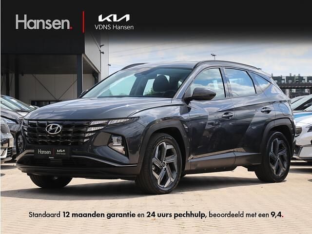 Grijs, metallic lak Gebruikt 2022 Hyundai Tucson Comfort SUV | € 27.945 (Super prijs) - Afbeelding 1/4