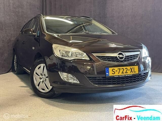 Bruin Gebruikt 2012 Opel Astra Sport Stationwagen | € 6.995 (Duur) - Afbeelding 1/4
