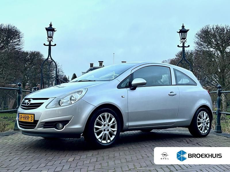 Grijs Occasion 2009 Opel Corsa Cosmo Hatchback | € 5.985 (Duur) - Afbeelding 1/4