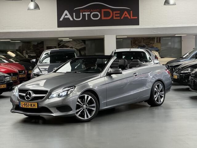 Grijs Gebruikt 2014 Mercedes E200 Edition Cabriolet | € 22.900 (Eerlijke prijs) - Afbeelding 1/4