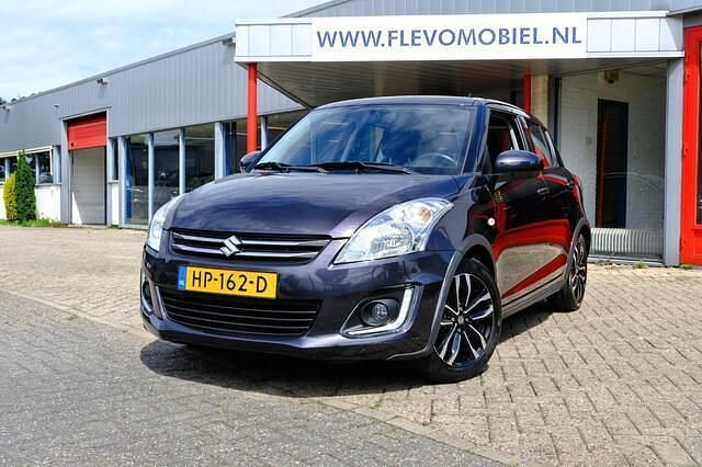 Grijs Gebruikt 2015 Suzuki Swift Style Hatchback | € 10.450 (Eerlijke prijs) - Afbeelding 1/4
