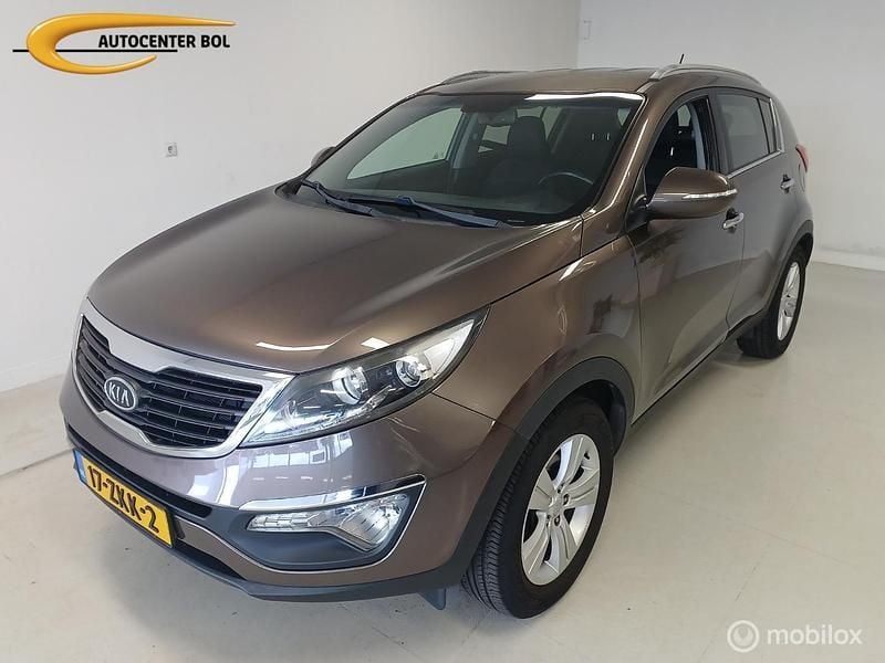 Bruin Gebruikt 2013 Kia Sportage Plus SUV | € 15.330 (Eerlijke prijs) - Afbeelding 1/4