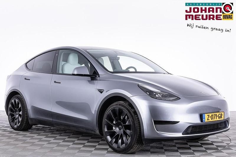 Grijs Occasion 2024 Tesla Model Y RWD SUV | € 34.900 (Eerlijke prijs) - Afbeelding 1/4