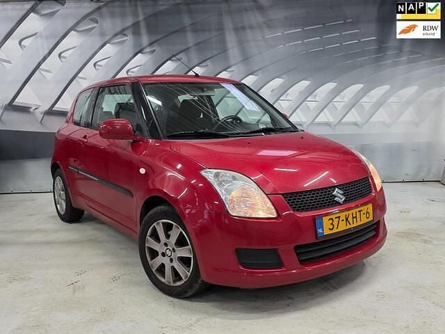 Rood Gebruikt 2009 Suzuki Swift Comfort Hatchback | € 3.499 (Eerlijke prijs) - Afbeelding 1/3