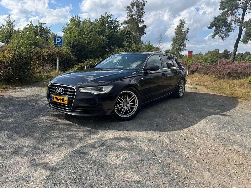 Zwart Gebruikt 2013 Audi A6 Stationwagen | € 11.900 (Goede deal) - Afbeelding 1/4