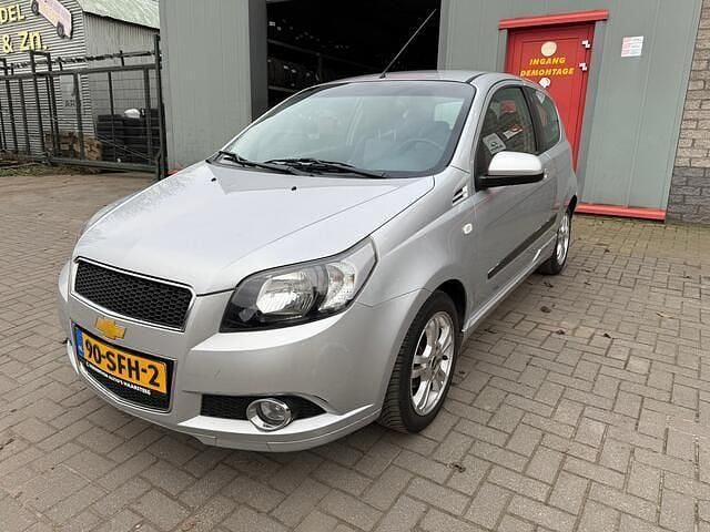 Grijs Gebruikt 2011 Chevrolet Aveo LS Hatchback | € 3.250 (Eerlijke prijs) - Afbeelding 1/4