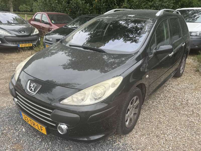 Zwart Gebruikt 2007 Peugeot 307 Premium Stationwagen | € 1.000 (Goede deal) - Afbeelding 1/4