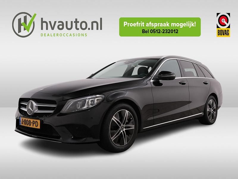 Zwart, metallic lak Gebruikt 2020 Mercedes C200 Business Stationwagen | € 27.900 (Goede deal) - Afbeelding 1/4