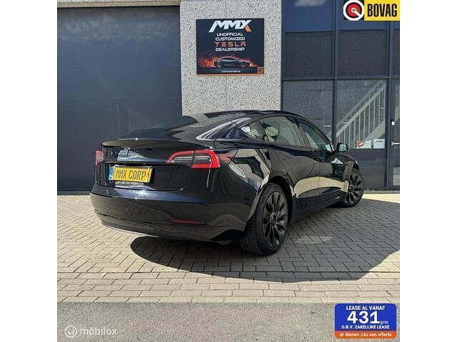 Zwart Gebruikt 2022 Tesla Model 3 Standard Range Sedan | € 26.890 (Eerlijke prijs) - Afbeelding 1/2