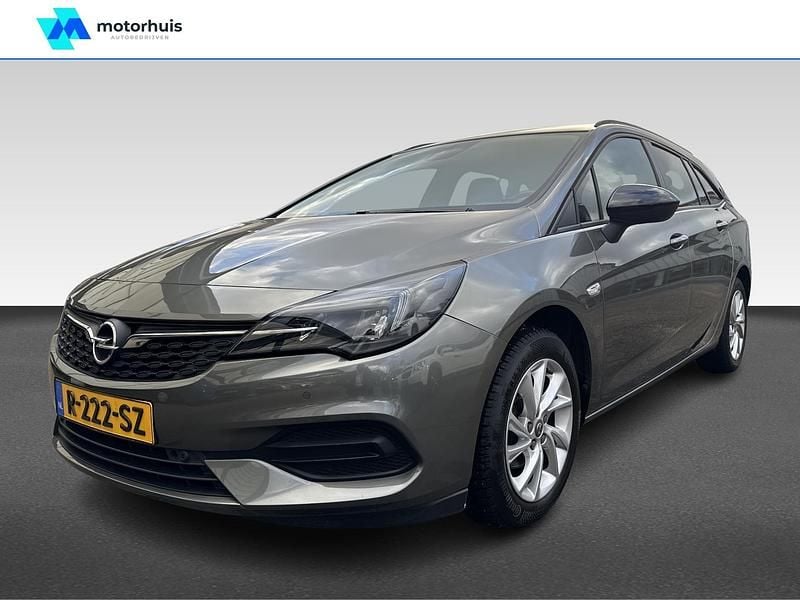 Grijs Gebruikt 2021 Opel Astra Business Stationwagen | € 15.245 (Goede deal) - Afbeelding 1/4