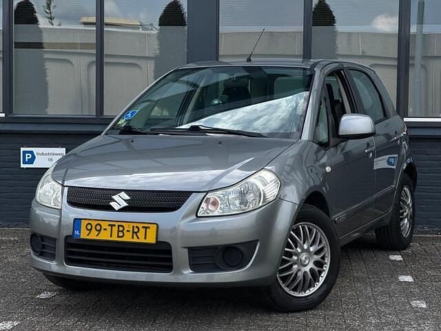 Grijs Gebruikt 2006 Suzuki SX4 MPV | € 3.950 (Eerlijke prijs) - Afbeelding 1/4