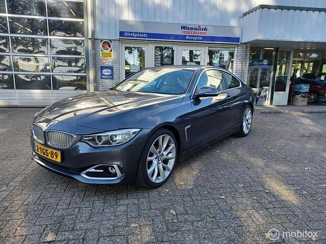 Grijs Gebruikt 2014 BMW 420 Executive Coupé | € 14.500 (Eerlijke prijs) - Afbeelding 1/4