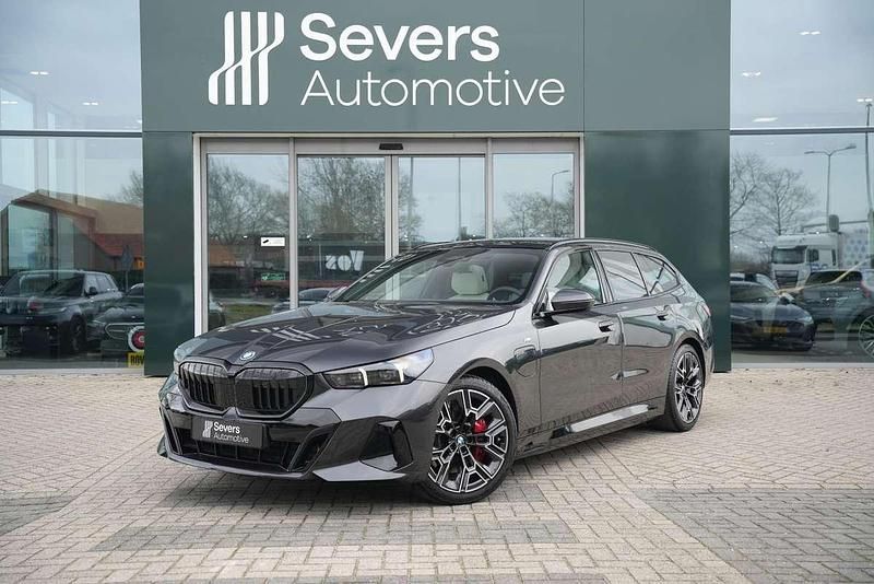 Occasion BMW 550e M Sport 489 PK (359 kW) 2025 Grijs Stationwagen