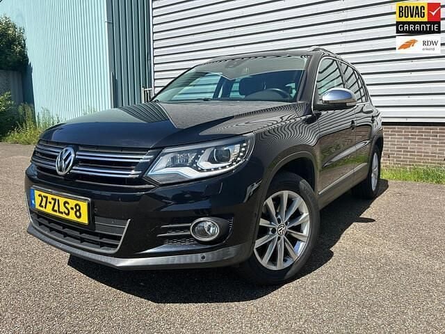 Zwart Gebruikt 2013 VW Tiguan Sport SUV | € 13.950 (Goede deal) - Afbeelding 1/4