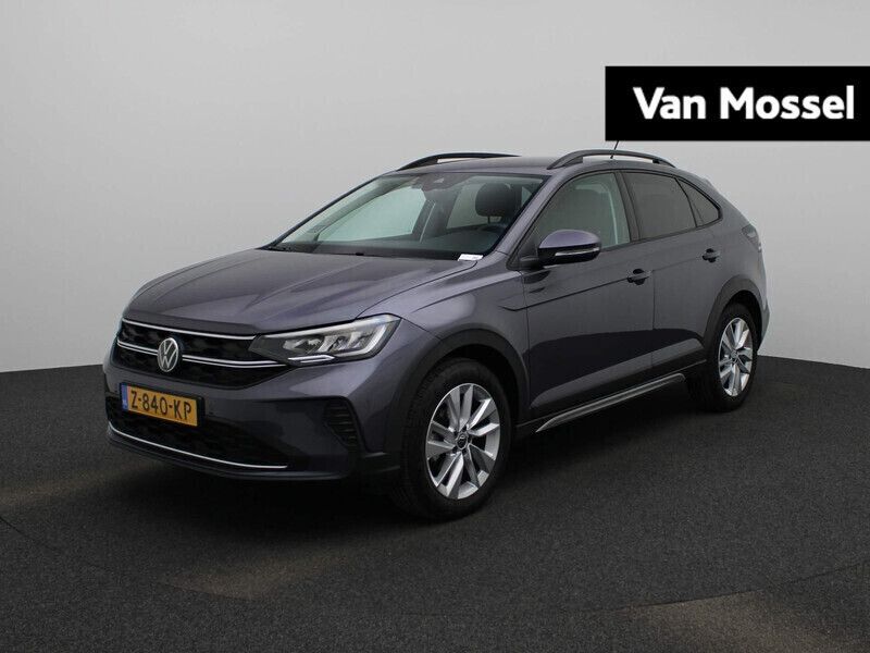 Grijs Gebruikt 2024 VW Taigo Business SUV | € 22.845 (Eerlijke prijs) - Afbeelding 1/2