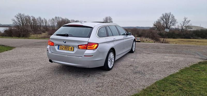 Occasion BMW 520 Executive 184 PK (135 kW) 2012 Zilver Stationwagen