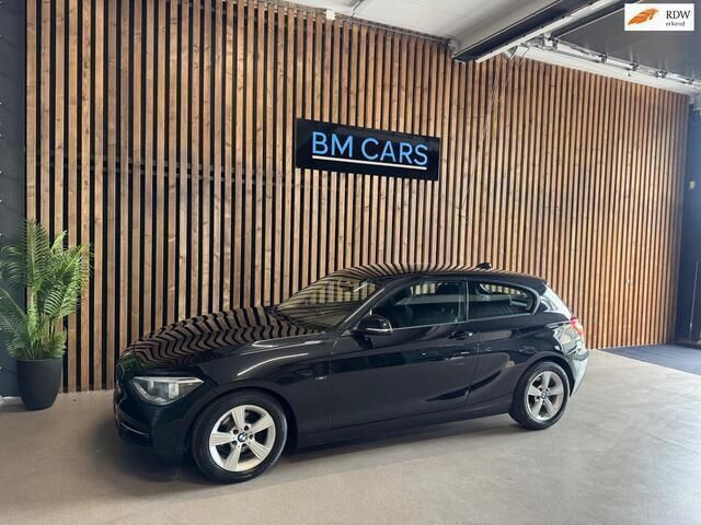 Zwart Gebruikt 2013 BMW 114 Executive Hatchback | € 8.499 (Goede deal) - Afbeelding 1/4