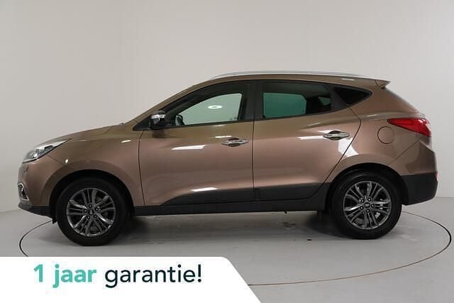 Bruin, metallic lak Gebruikt 2014 Hyundai ix35 SUV | € 14.950 (Eerlijke prijs) - Afbeelding 1/4