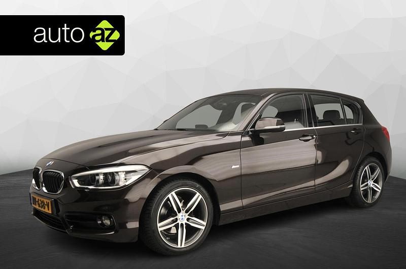 Bruin Occasion 2017 BMW 118 Sport Line Hatchback | € 15.900 (Eerlijke prijs) - Afbeelding 1/4
