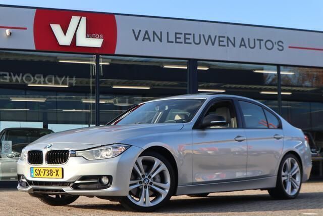 Grijs, metallic lak Gebruikt 2012 BMW 335 Executive Sedan | € 21.900 (Eerlijke prijs) - Afbeelding 1/4