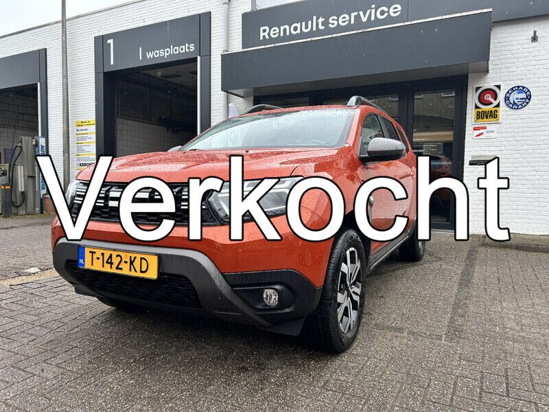Oranje Gebruikt 2023 Dacia Duster Journey SUV | € 24.321 (Eerlijke prijs) - Afbeelding 1/4