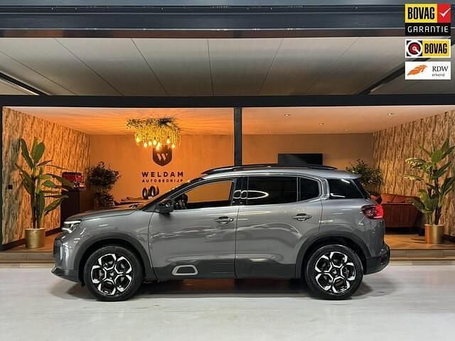 Grijs (metallic) Gebruikt 2023 Citroën C5 Aircross PureTech SUV | € 25.990 (Goede deal) - Afbeelding 1/4