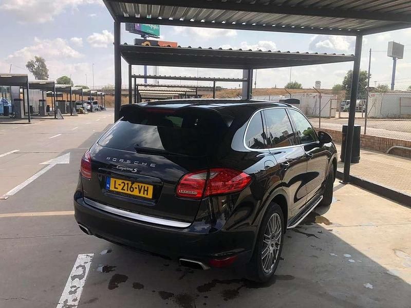 Zwart Gebruikt 2010 Porsche Cayenne SUV | € 14.990 (Eerlijke prijs) - Afbeelding 1/4